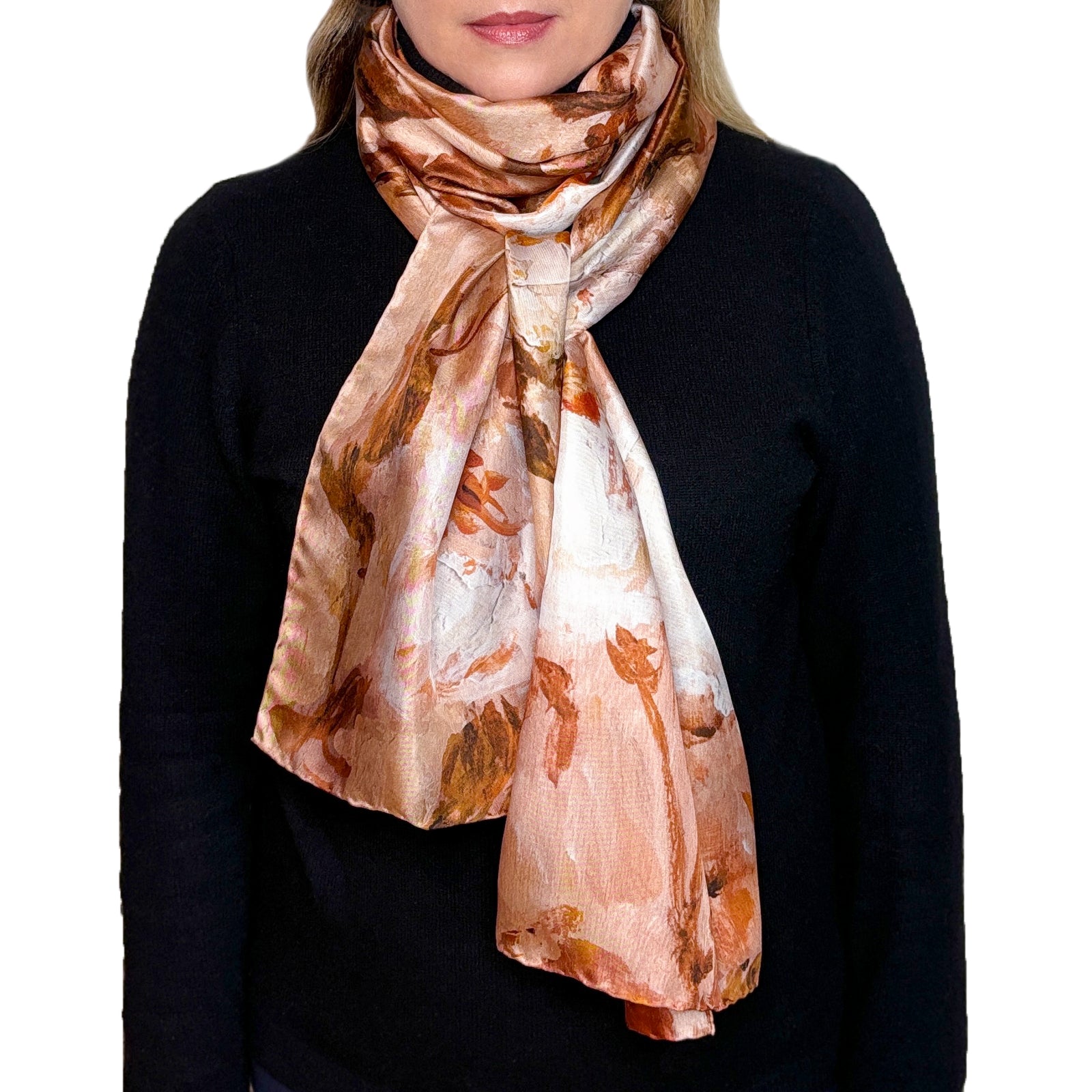 Woman in black wearing a long silk scarf with white roses and a beige background, Whispering Roses, from Oksana Fine Art and Design