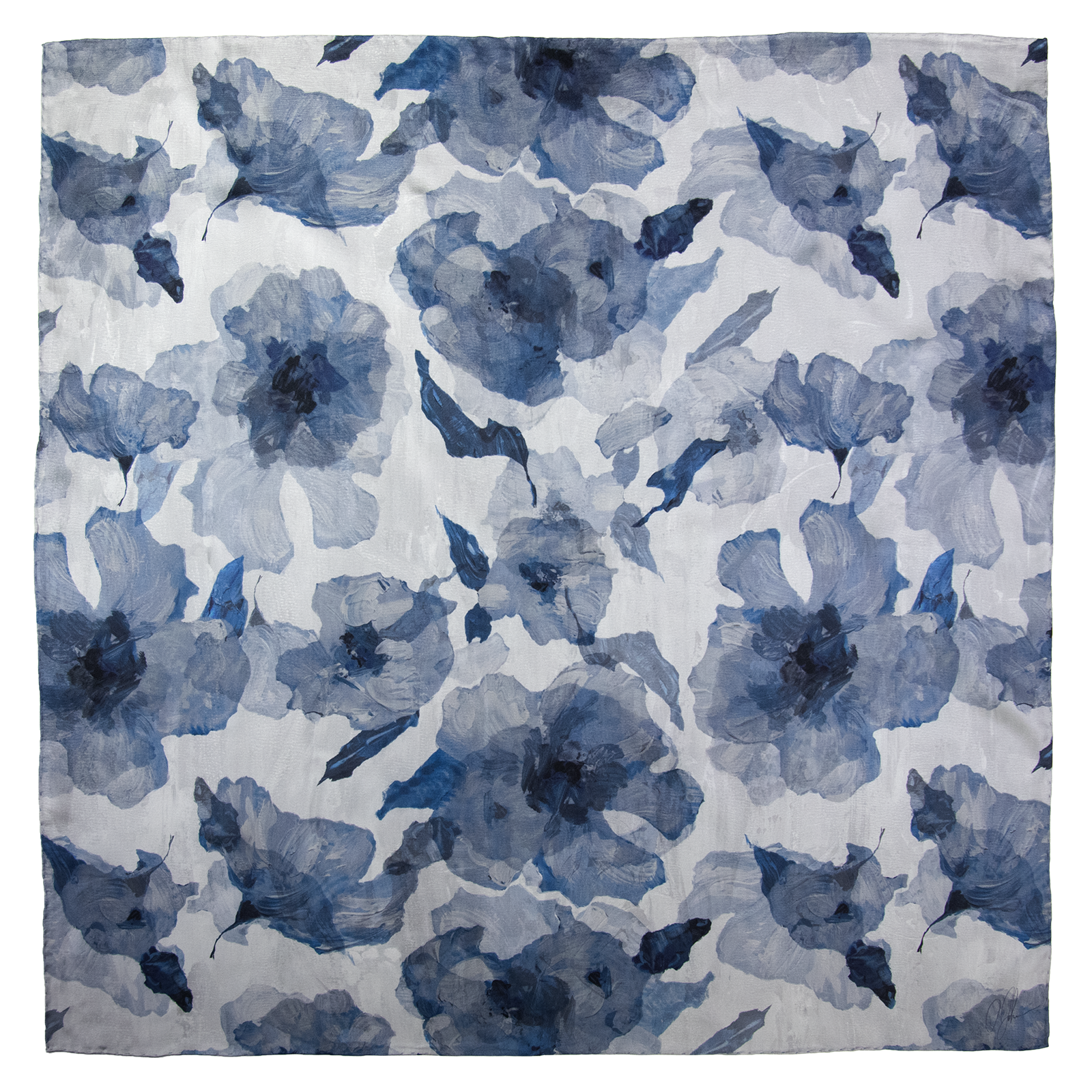 Woman wearing a silk scarf with overlapping floral images in blue tones, and hand-hemmed edges, along with a black top. 