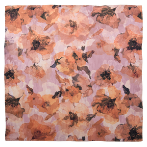 Square silk scarf with overlapping floral images in peach, pink, and dark colors, and hand-hemmed edges. 