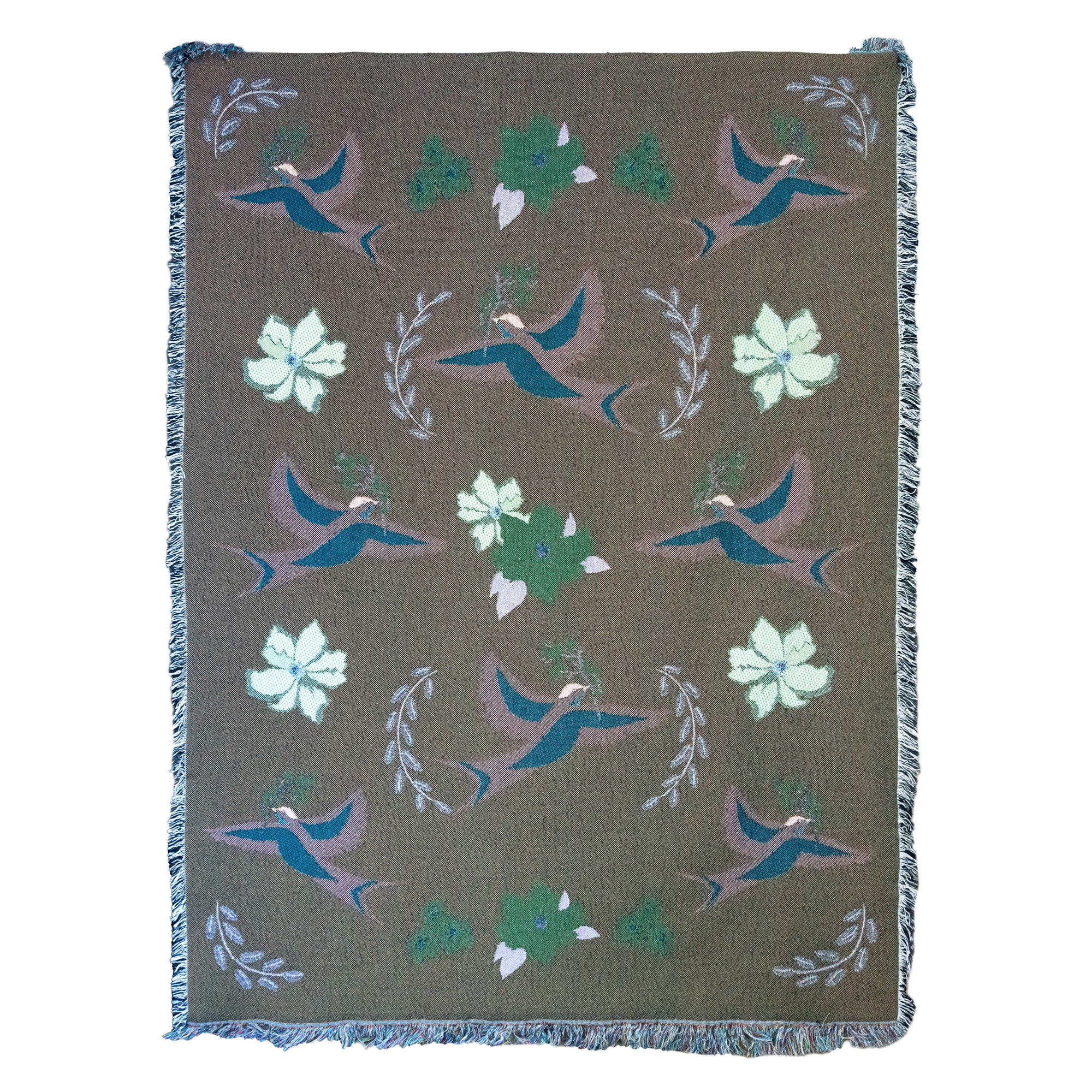 Back side of reversible decorative woven blanket, showing bird images in darker colors and light flowers against a brown background.  