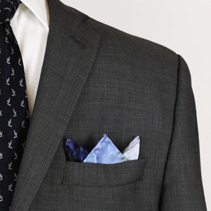 South Beach Harbor 16.5-inch San Francisco silk scarf styled as a men's pocket square with a gray suit and a blue tie